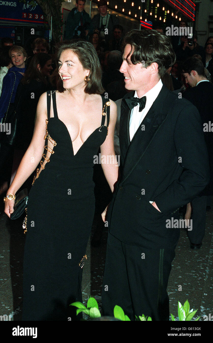 Actor Hugh Grant arrives with actress girlfriend Elizabeth Hurley for the  charity premiere of 