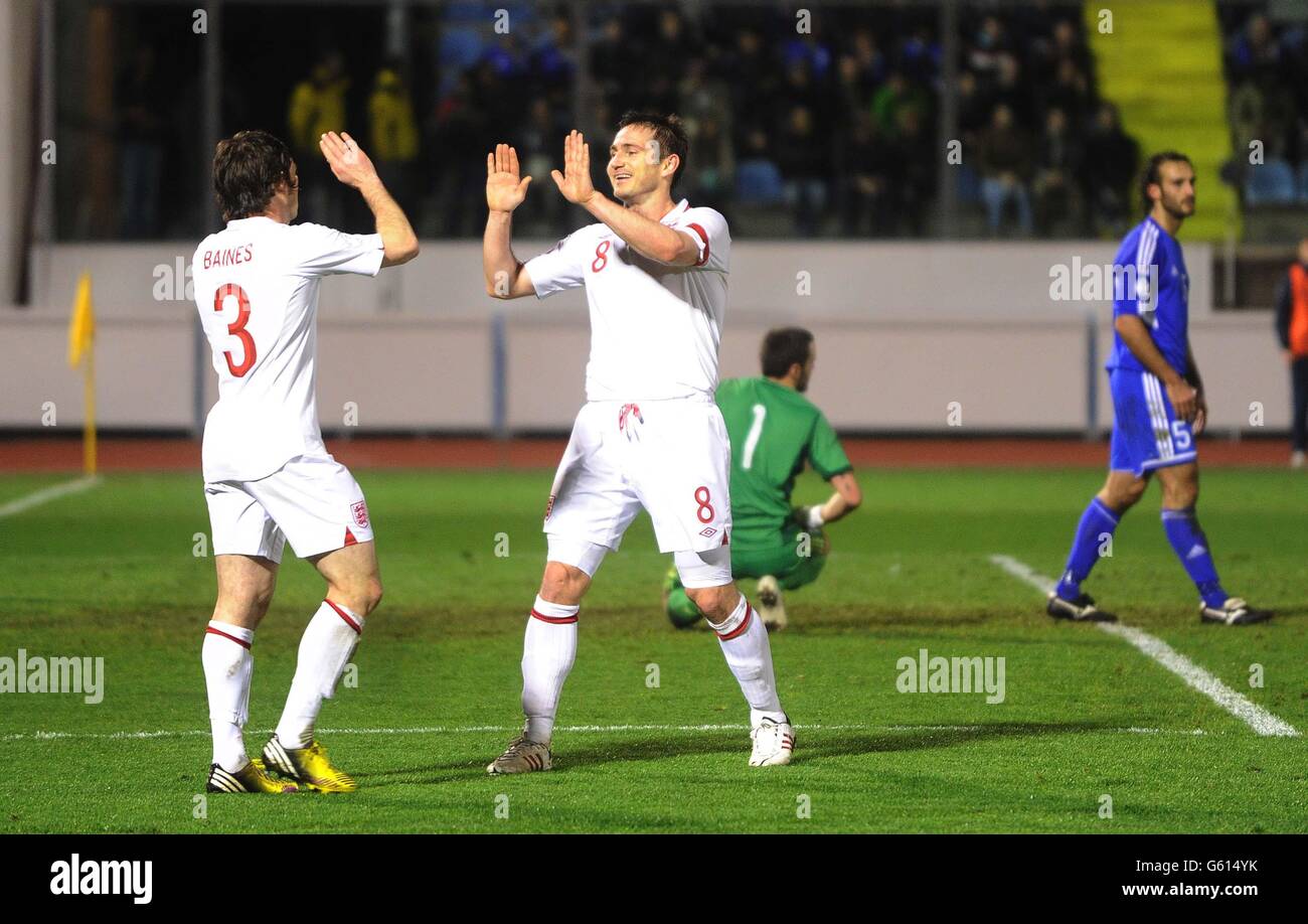 England's Frank Lampard celebrates his goal with Leighton Baines (left) during the 2014 World Cup Qualifier at Serravalle Stadium, Serravalle, San Marino. Stock Photo