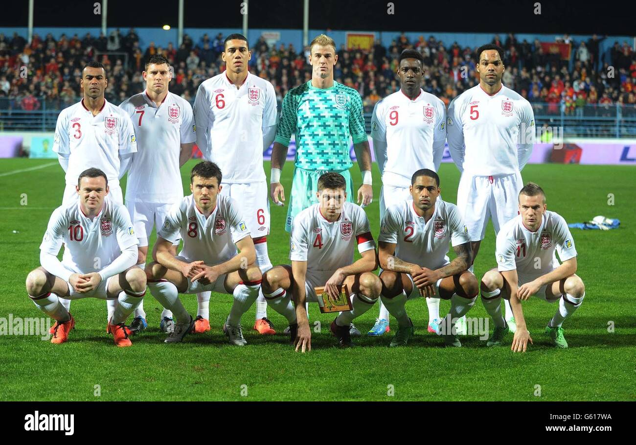 England's (back row left to right) Ashley Cole, James Milner, Chris Smalling, Joe Hart, Danny Welbeck, Joleon Lescott (front row left to right) Wayne Rooney, Michael Carrick, Steven Gerrard, Glen Johnson and Tom Cleverley line up before the FIFA World Cup Qualifying, Group H match at the City Stadium, Podgorica, Montenegro. Stock Photo
