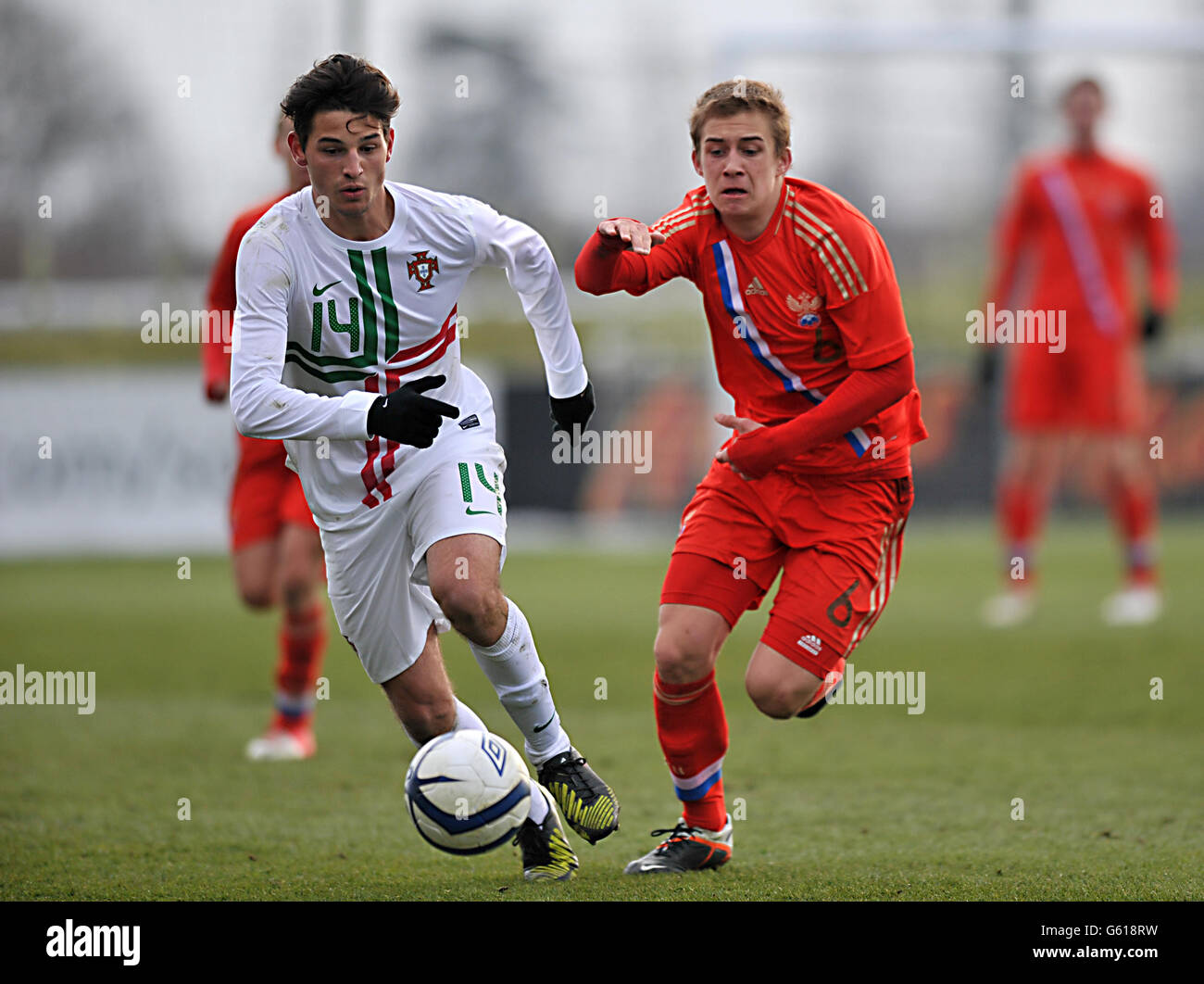 Russia Under 17's Dmitriy Barinov (left) and Portugal Under 17's Jose Ze Gomes Stock Photo