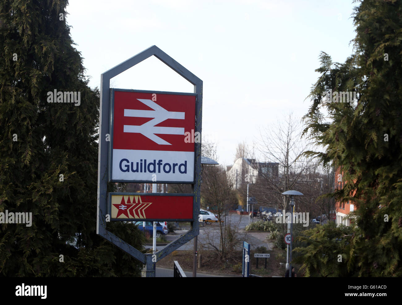 A sign outside Guildford railway station in Guildford, Surrey where 22-year-old Ryan Harrison died after being hit by a train following an altercation with a number of other men. Stock Photo