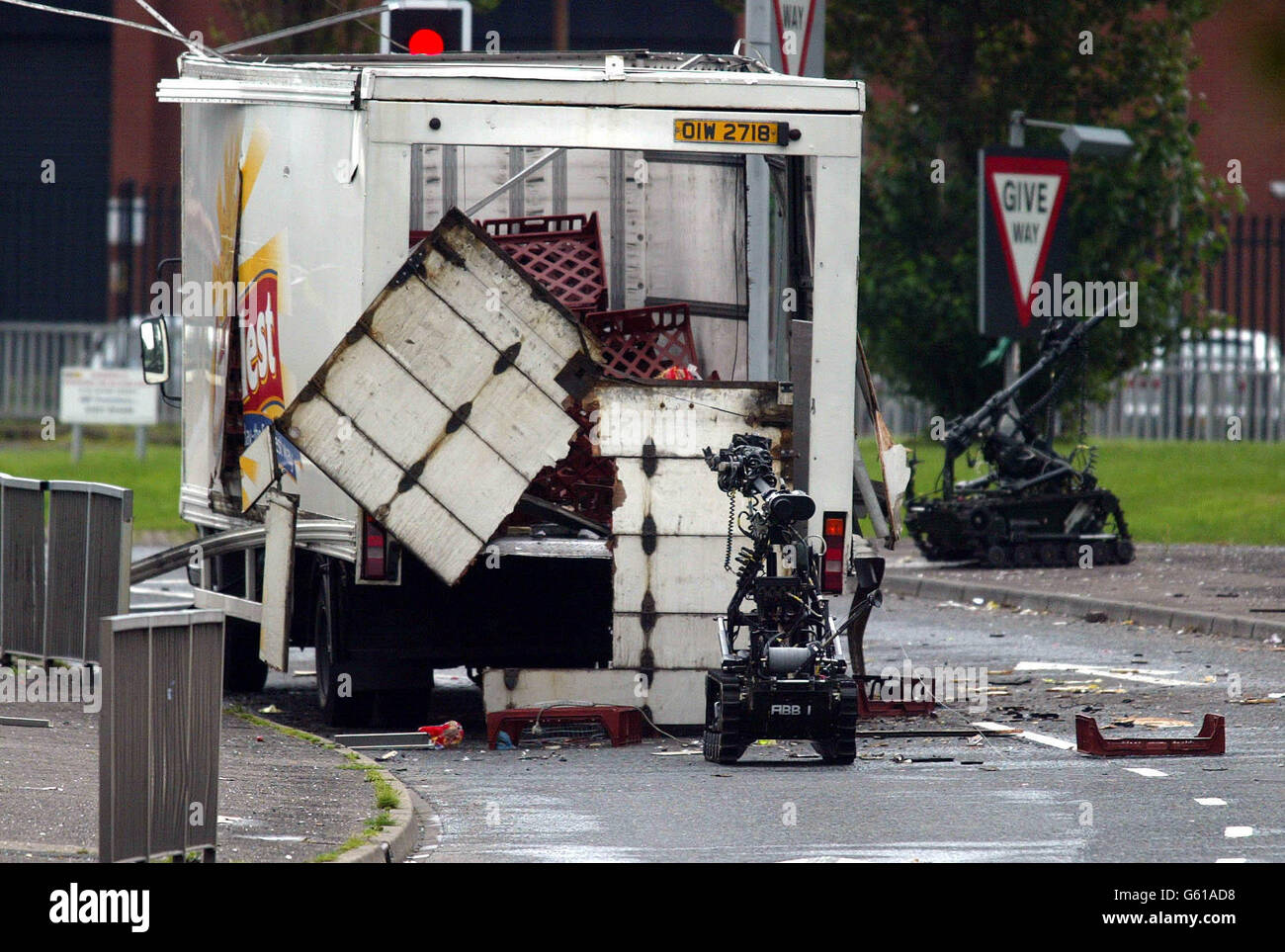 British Army robots carry out controlled explosions on a bread van in Belfast city centre, Northern Ireland. *The suspect device caused massive traffic problems, the security forces moved on the van at midday after it was abandoned in what is thought to be a suspect bomb by dissident Irish Republican terrorists. Stock Photo