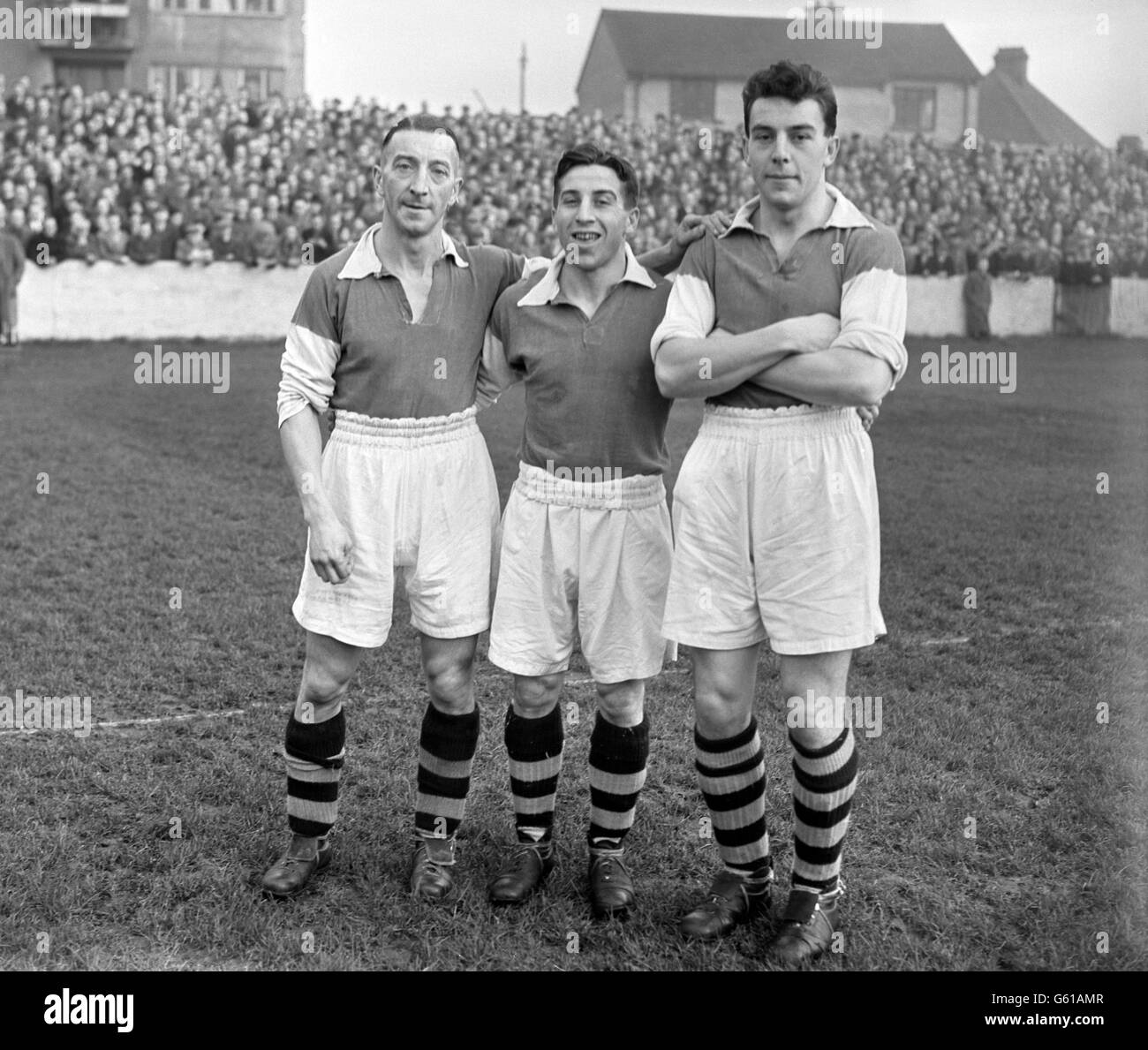Soccer - FA Cup - Second Round Replay - Walthamstow Avenue v Ipswich Town - Green Pond Road. James &#8216;Bunny&#8217; Groves, Reg Groves and Vic Groves who all play for Walthamstow Avenue. Stock Photo