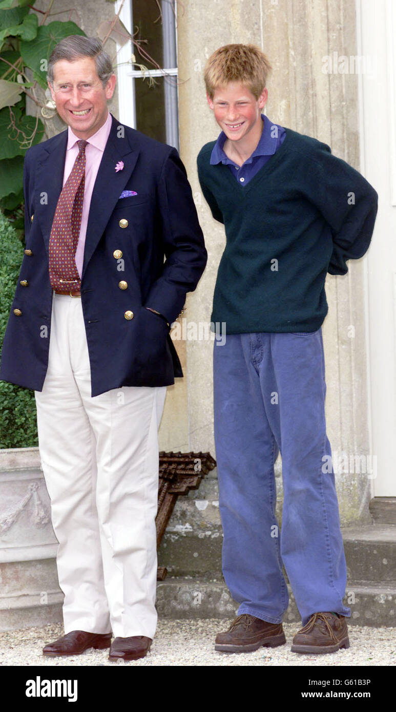The Prince of Wales with his son Prince Harry during a photocall at Prince Charles country home, Highgrove Estate in Gloucestershire, at the beginning of Prince Harry and Prince William's summer holidays. Earlier Prince William, 17, arrived for the photocall at a wheel of car in which he his learning to drive. Stock Photo