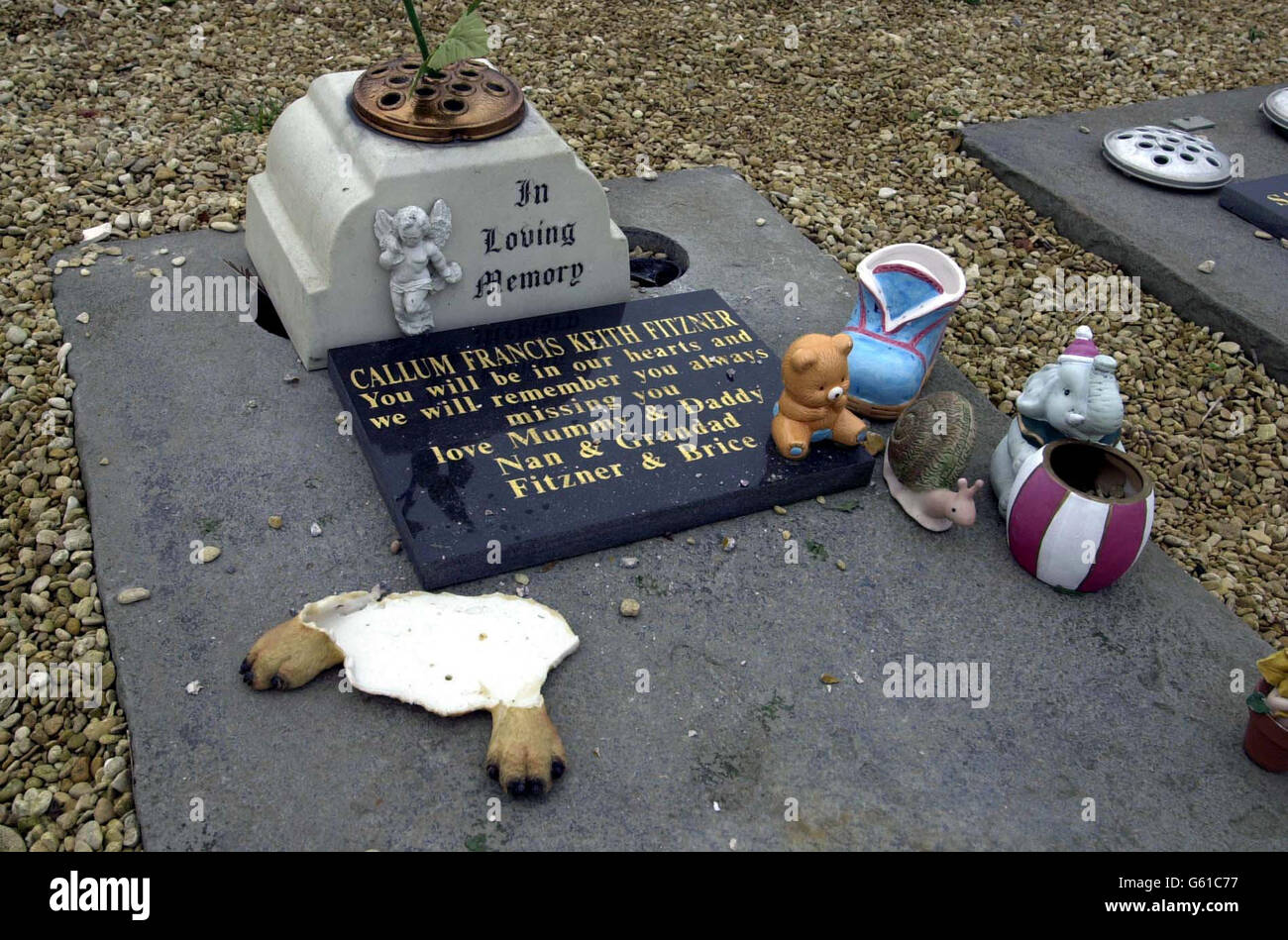 Damaged grave of a child at the baby section of the South Bristol Crematorium and Cemetery in Bridgwater Road, Bedminster Down, Bristol. Grieving parents were visiting their children's graves after vandals desecrated a cemetery. *...Wreckers struck in the baby section overnight on Saturday. Police were studying CCTV pictures and seeking witnesses to the desecration. Stock Photo