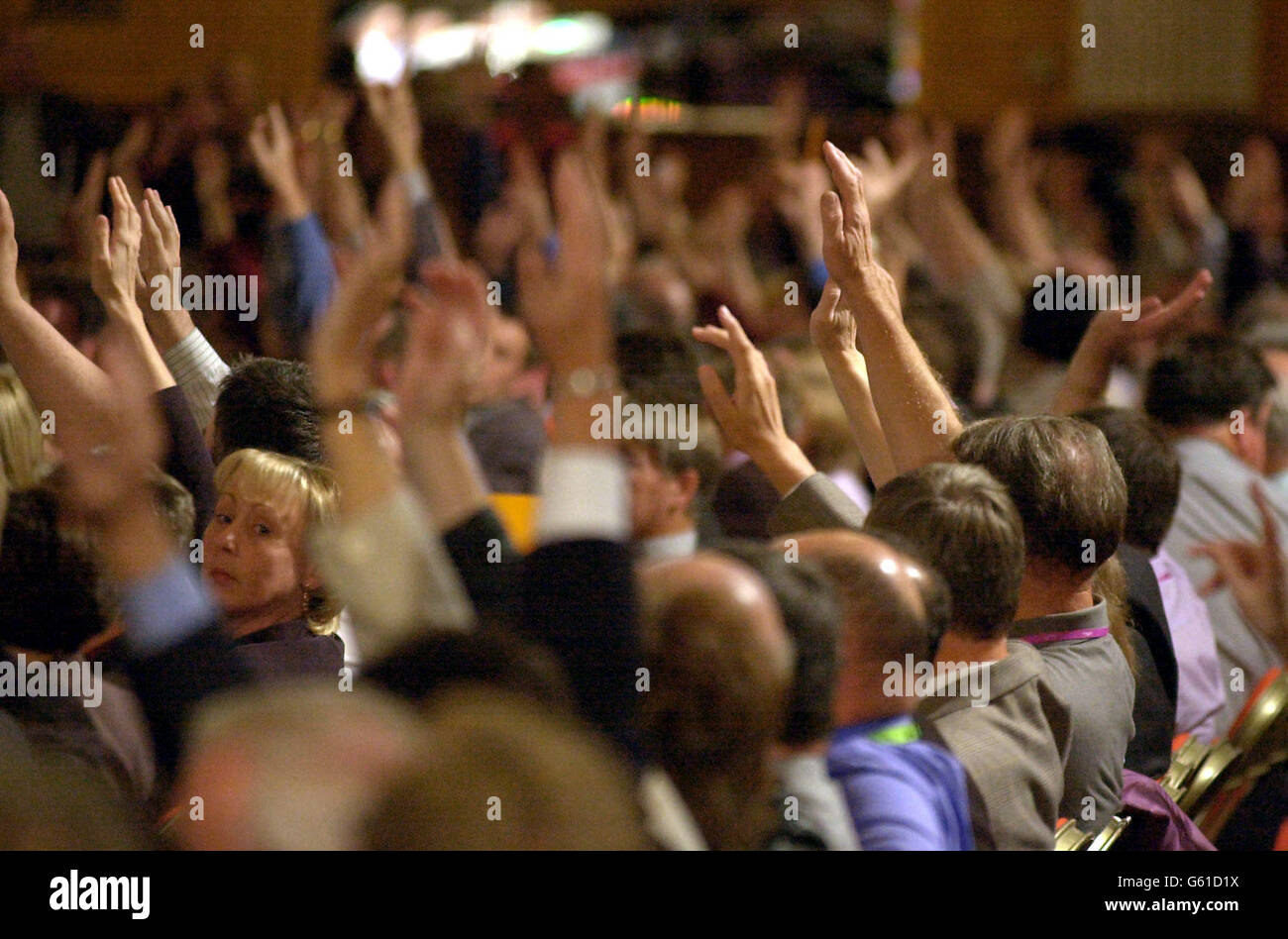Close vote as a show of hands is taken from TUC delegates on a hard line amendment to the General Council Motion on the possible conflict in Iraq, which went to a card vote before being defeated in Blackpool. Stock Photo