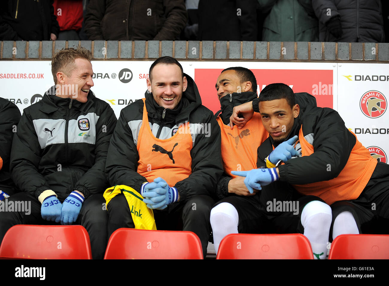 L-R: Coventry City's Gary McSheffrey, David Bell, Callum Wilson and Jordan Clarke on the substitutes bench Stock Photo