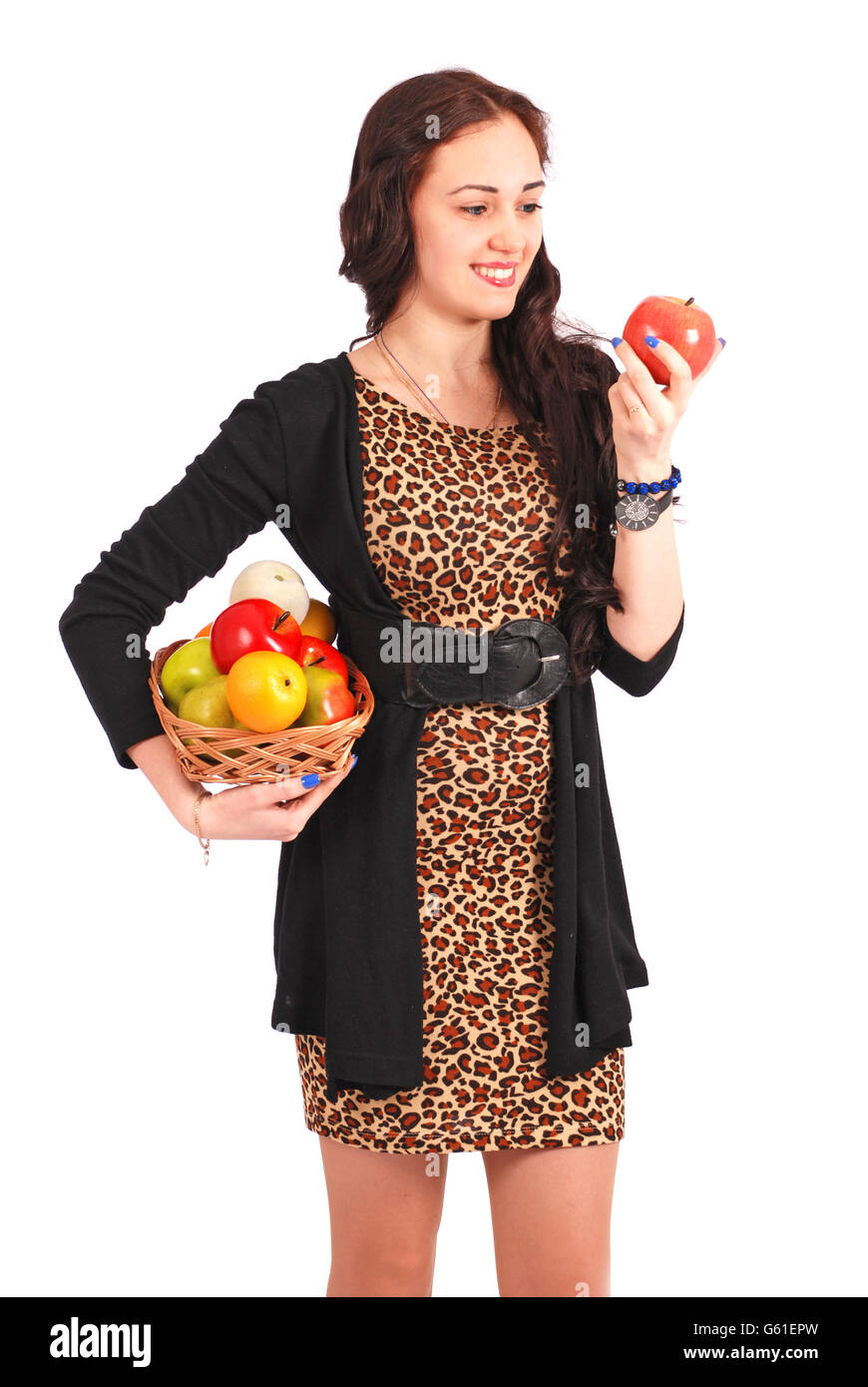 Young girl with a fruit basket isolated on white Stock Photo - Alamy