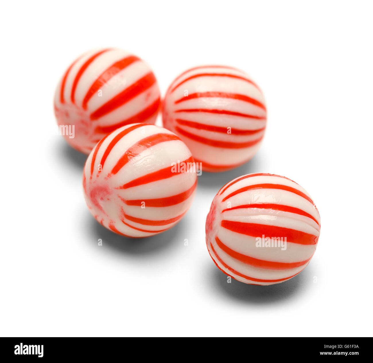 Four Peppermint Balls Isolated on White Background. Stock Photo