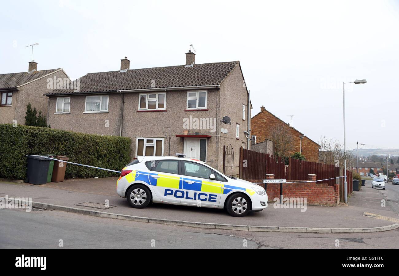Bedfordshire Police remain outside a house on Brunel Road in Luton