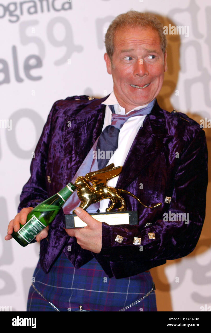Scottish director Peter Mullan holds the Golden Lion award during the closing ceremony of the 59th Venice film festival, Venice, Lido, Italy. Mullan won the Golden Lion award for his film 'The Magdalene Sisters'. Stock Photo