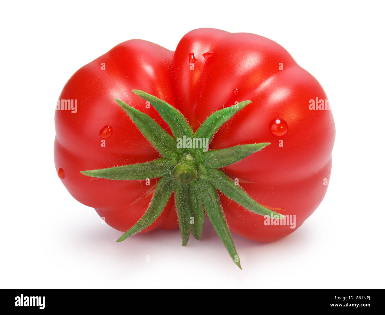 Ripe heirloom Tomato, Togorific variety (Solanum lycopersicum). Clipping paths for both tomato and shadow, infinite depth of fie Stock Photo