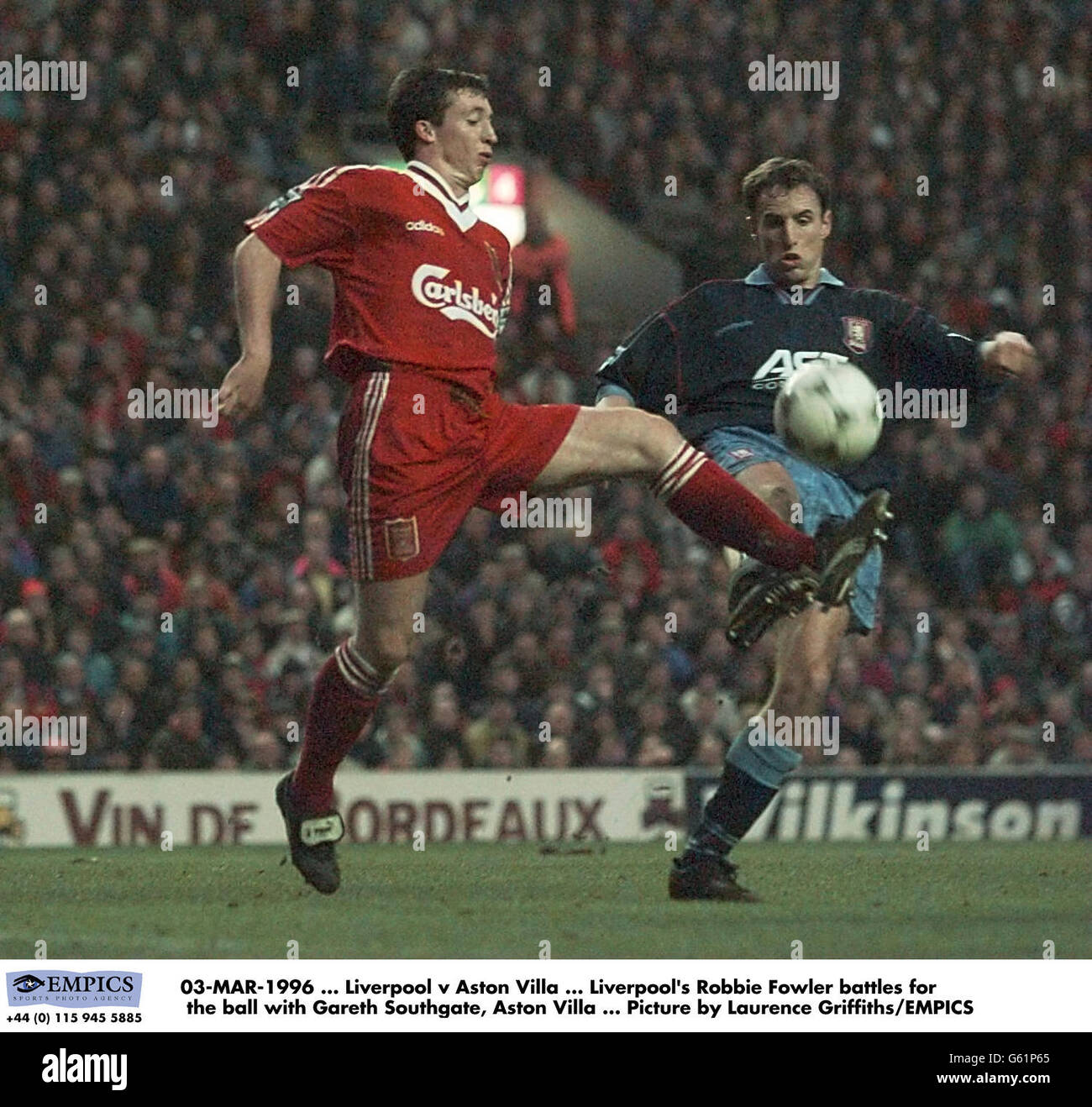 03-MAR-1996, Liverpool v Aston Villa, Liverpool's Robbie Fowler battles for the ball with Gareth Southgate (Aston Villa), Picture by Laurence Griffiths/EMPICS Stock Photo