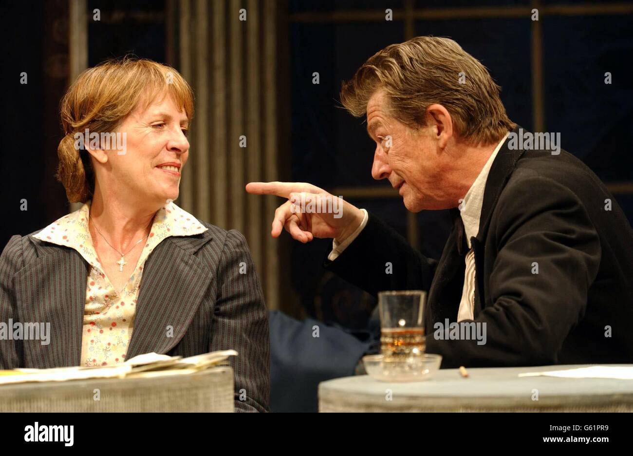 Actors John Hurt and Penelope Wilton during a photocall for their play 'Afterplay' at the Gielgud Theatre on Shaftbury Avenue in London. The play written by Brian Friel open on Thursday 19 September. Stock Photo