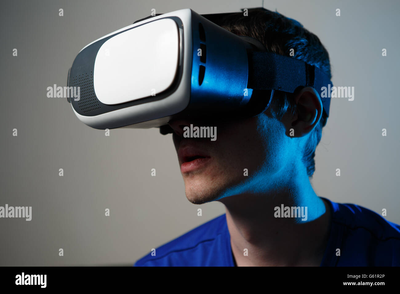 Man wearing virtual reality goggles Stock Photo - Alamy