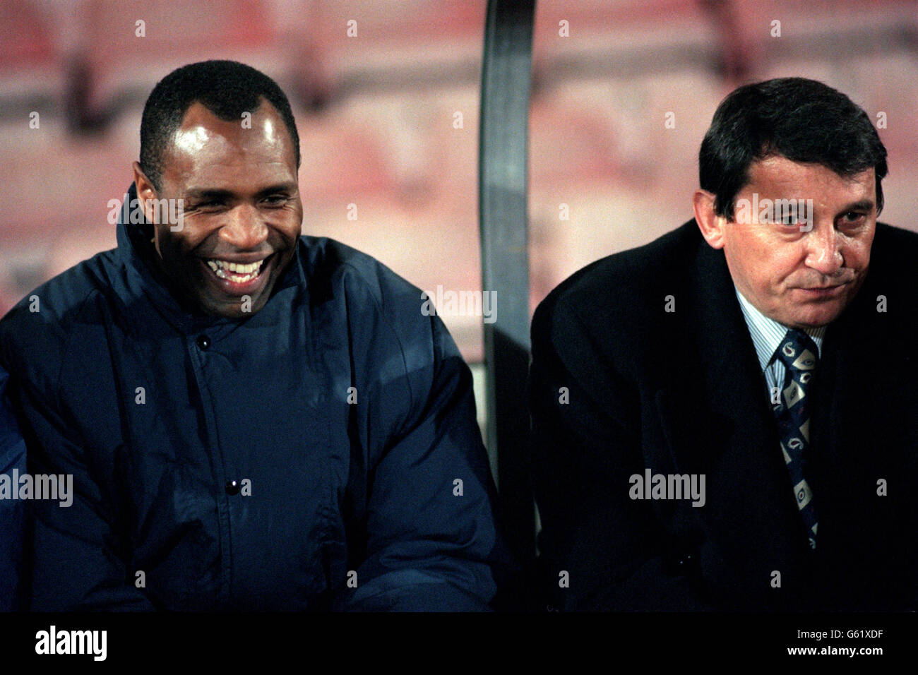 Watford manager Graham Taylor (r) sat with his coach Luther Blissett (l) Stock Photo