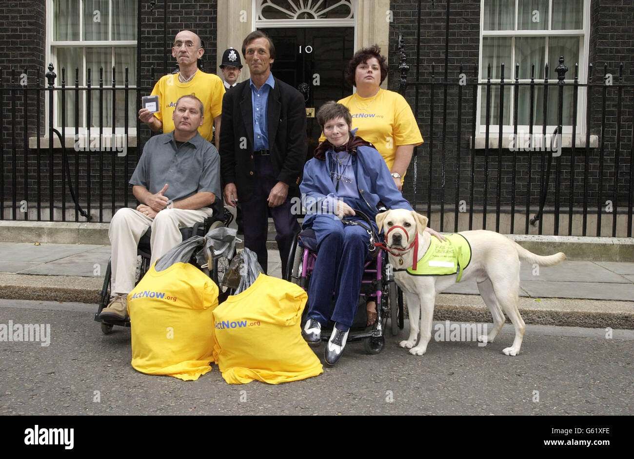 Brian Pretty (centre), the widower of 'right to die' campaigner Diane Pretty, stands outside 10 Downing Street, with four terminally ill people (clockwise from top left - Steve Barksly from Manchester who has AIDS. * Lisa Cook from Huddersfield who suffers from Huntingdons disease, Jane McDonald, from London who has MS and teminal cancer and John Howard from Worthing, Sussex who suffers from motor neurone disease) after delivering the largest on-line petition ever received by the PM's office. The petition organised by Act Now, was signed by 50,000 people with terminal illness, calling for a Stock Photo