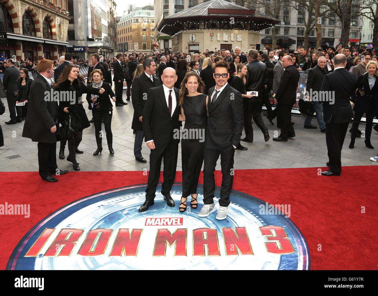 Sir Ben Kingsley, Susan Downey and Robert Downey Jr arriving for the premiere of Iron Man 3 at the Odeon Leicester Square, London. Stock Photo