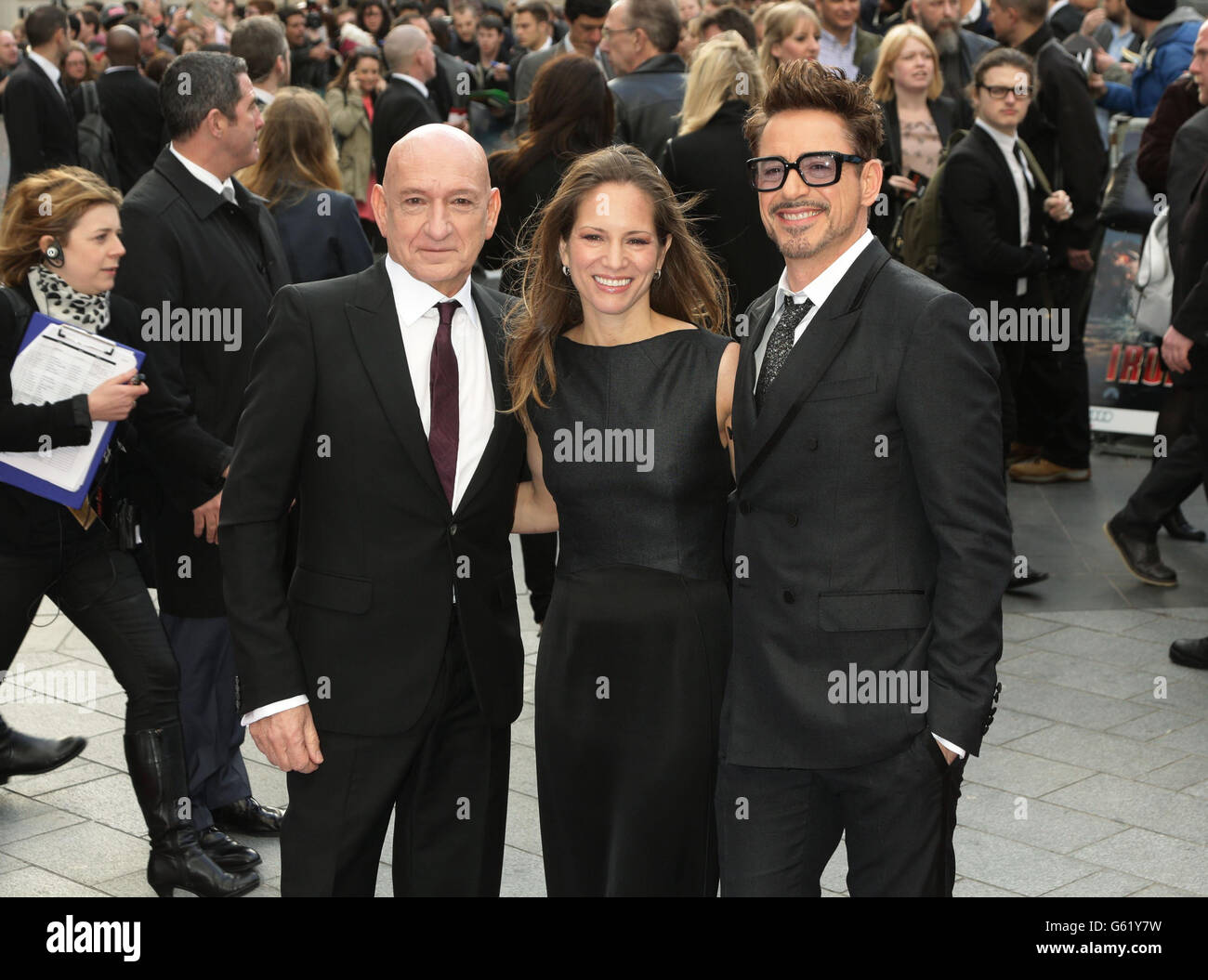 Sir Ben Kingsley, Susan Downey and Robert Downey Jr arriving for the premiere of Iron Man 3 at the Odeon Leicester Square, London. Stock Photo