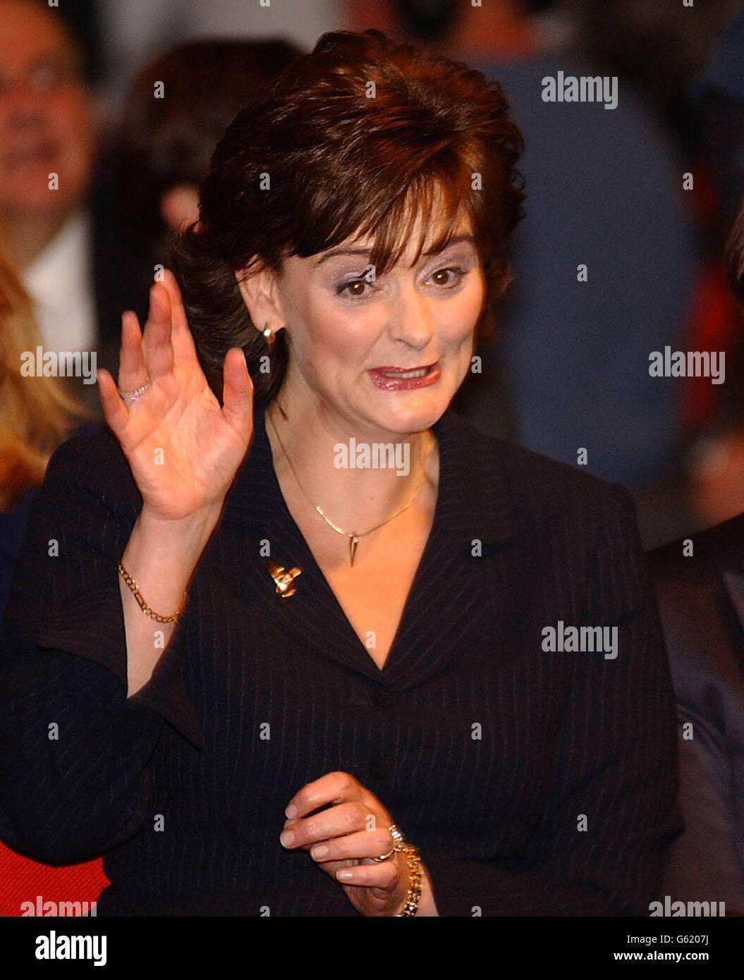Cherie Blair waves to her husband Prime Minister Tony Blair as he