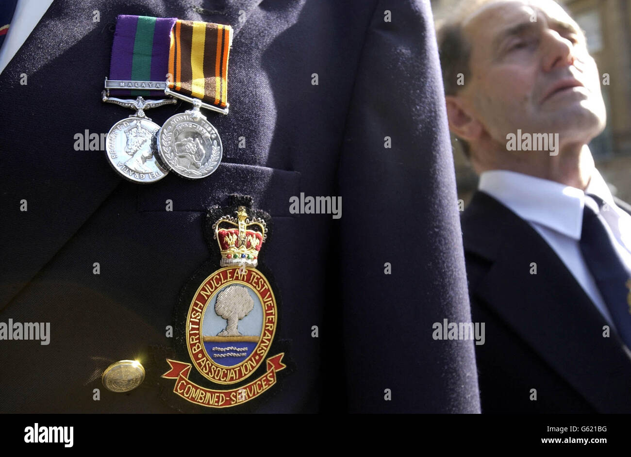 The Atomic Test Medal is displayed proudly on the chest of Christmas Island veteran, Richard Bonas from Berkshire, as he stands alondside Raymond Edgar Kennedy, 64, from Northumberland, who witnessed seven nuclear tests off the Australian coast. *... outside Downing Street. The pair were amongst a group of veterans from around the country protesting against alleged refusal by the Ministry of Defence over the awarding of pensions to veterans of the Atomic test, staged by the British Government in 1952. The medal was awarded by the Australian Government for services in radioactive areas. The Stock Photo