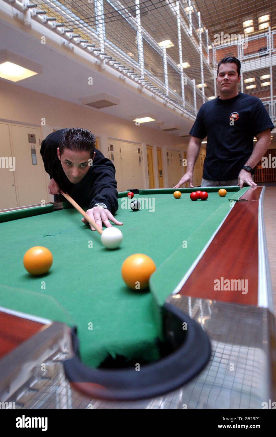 Prisoners play pool inside Wormwood Scrubs prison in west London, which is still riddled with serious problems four years after a culture of staff brutality was exposed, the Chief Inspector of Prisons said in a new report. * Although the 1,000-inmate jail is now rid of rogue officers who violently assaulted inmates, the institution is still 'stigmatised and struggling to move on' Anne Owers said. Stock Photo