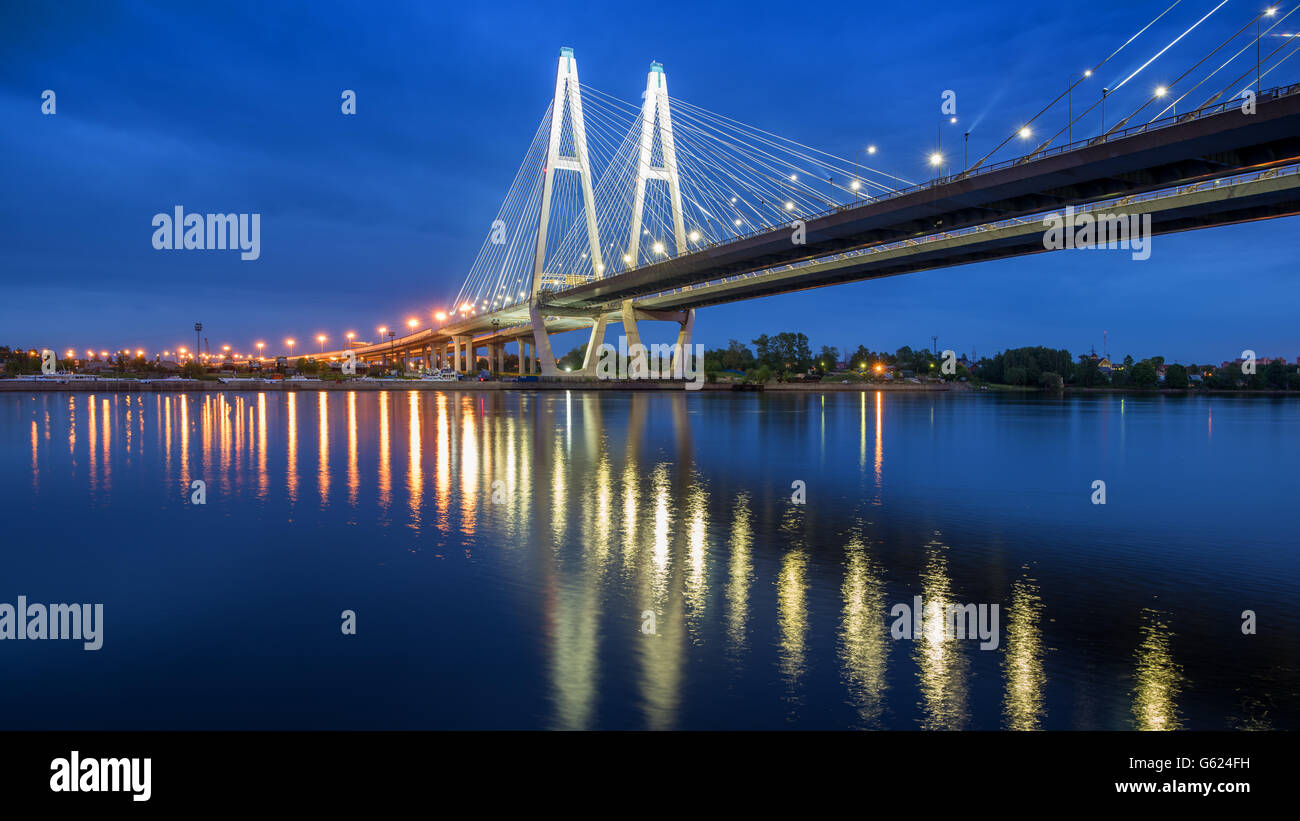 Bolshoy Obukhovsky Bridge at the morning light, calm water, lights, Saint-Petersburg, Russia Stock Photo