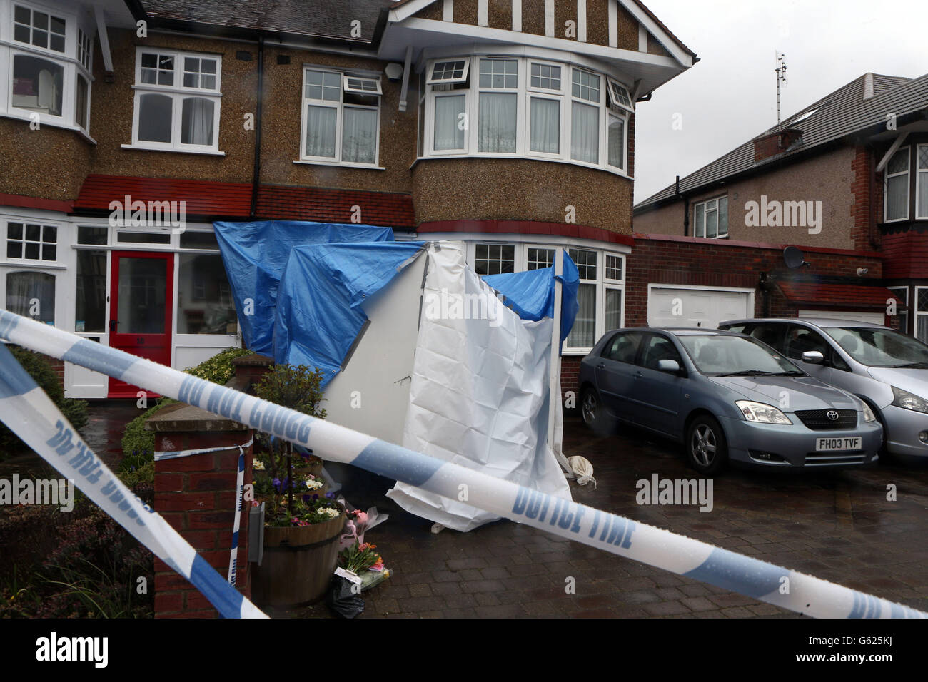 The scene at a property in Midcroft, Ruislip, northwest London, where