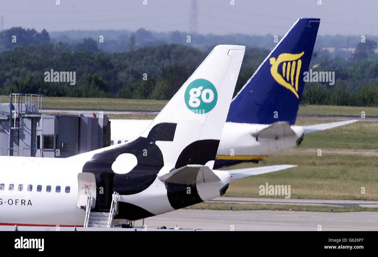 London Stansted Airport. A GO and Ryanair plane on stand at Stansted Airport. Stock Photo