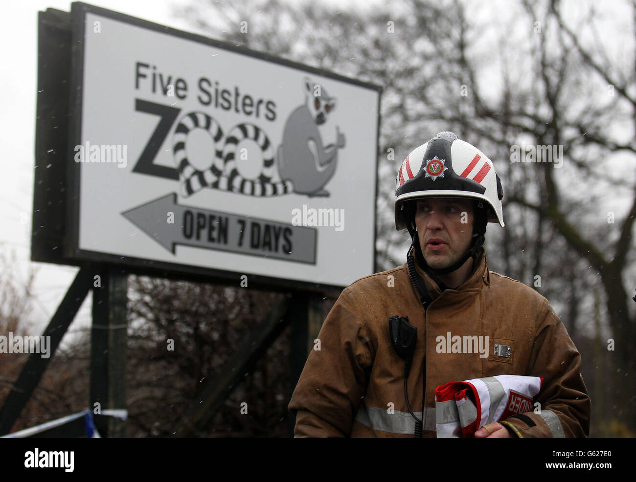 Fire at Five Sisters Zoo. A firefighter views the damage to the reptile house at the Five Sisters Zoo at Polbeth, West Calder. Stock Photo