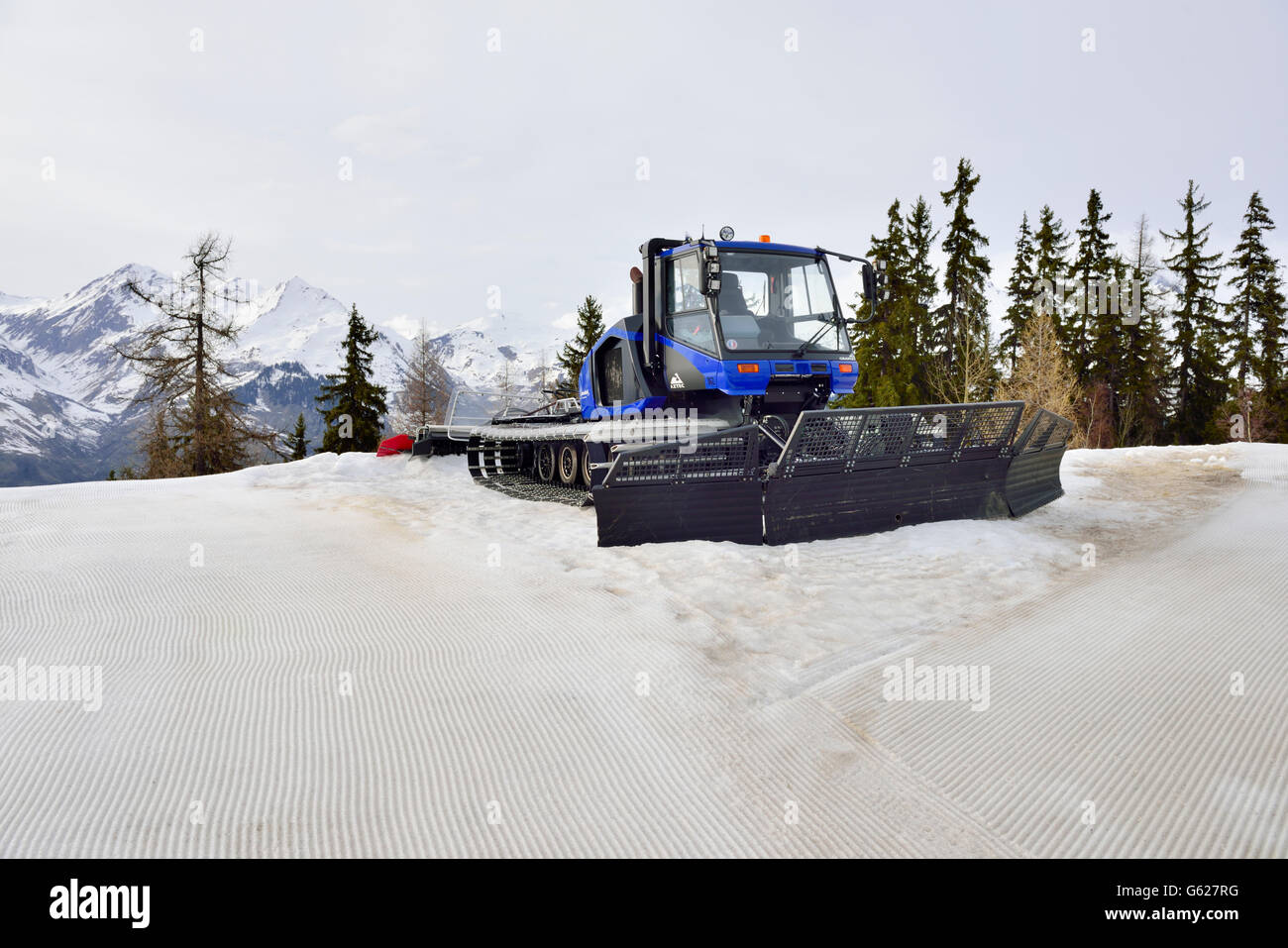 Snow plow using for preparing ski pistes Stock Photo Alamy
