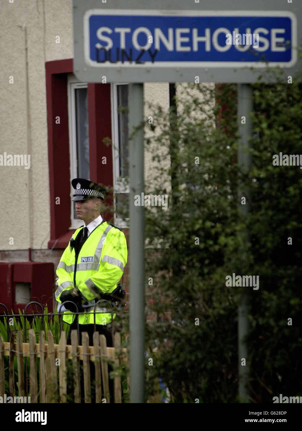 Police wait outside a house in Stonehouse, Lanarkshire, where 10-year-old Louise Gilmour was discovered with the body of her six-year-old sister, Erin. * A 36 year old woman who was also in the house was taken to hospital where police said she was being detained under observation. Louise is currently in Glasgow's Southern General Hospital where her condition was described as serious but stable. Stock Photo
