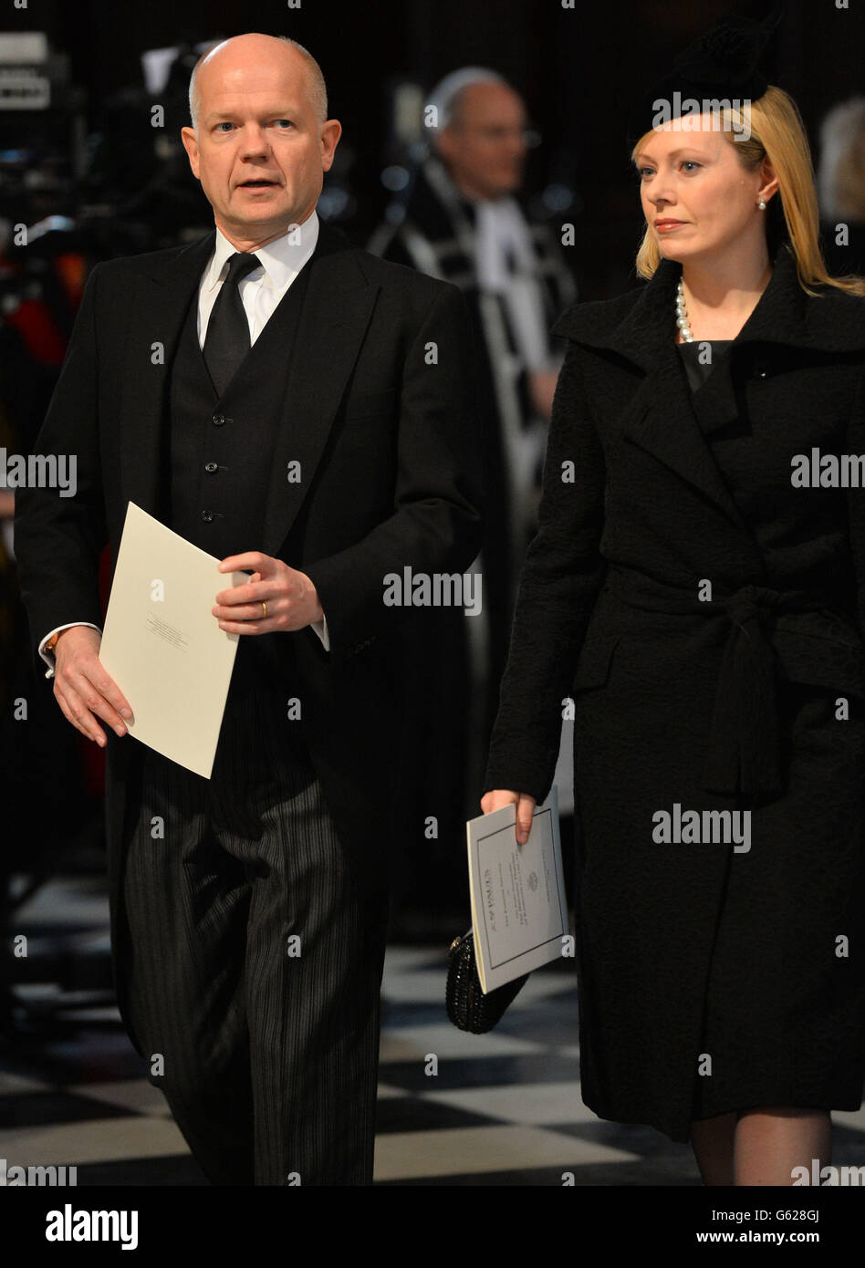 British Foreign Secretary William Hague (L) and wife Ffion Jenkins (R) attend the funeral service of Baroness Thatcher, at St Paul's Cathedral, central London. Stock Photo