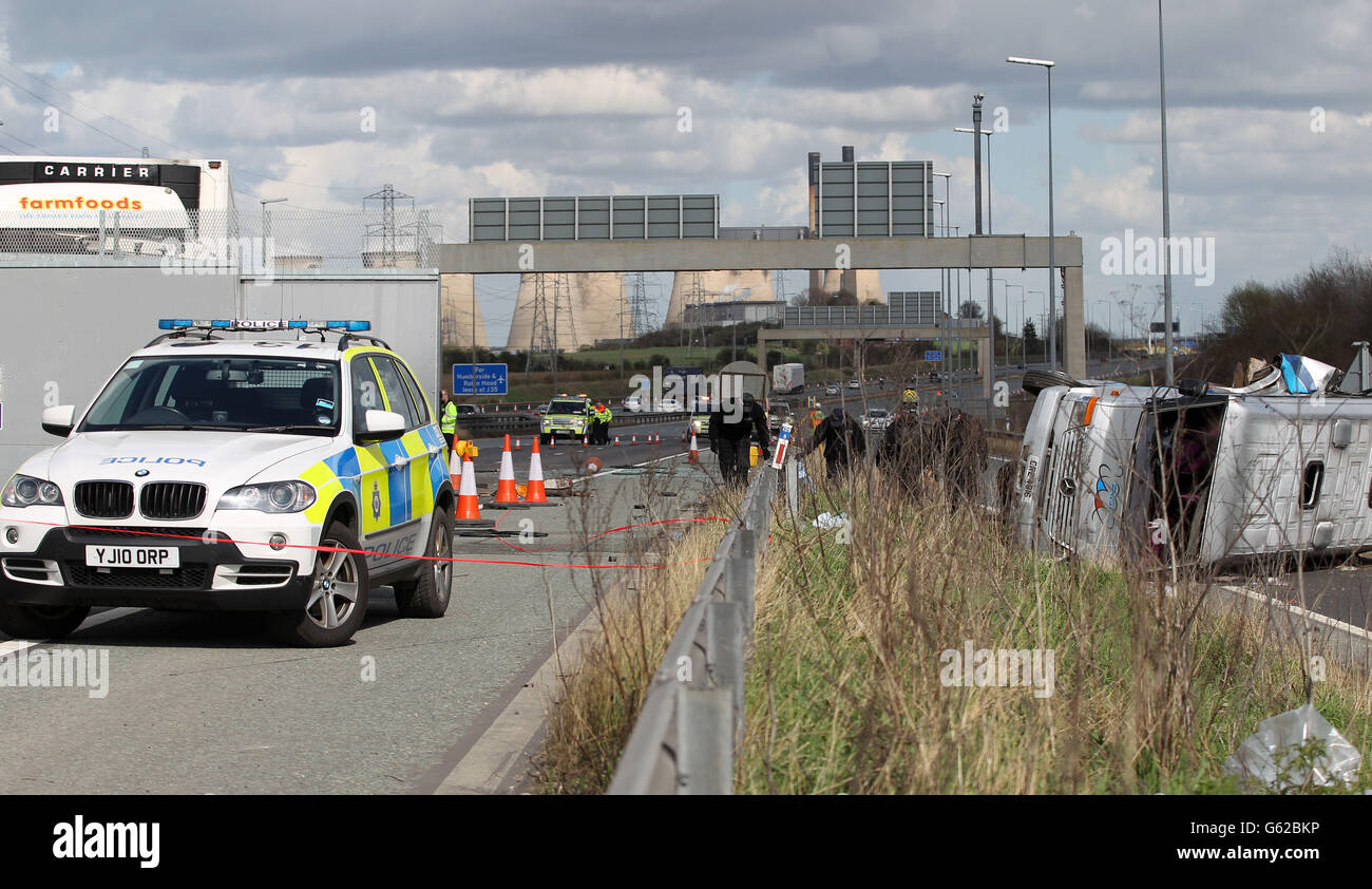 The scene of a road traffic accident on the westbound carriage of the M62 near Pontefract in West Yorkshire between a lorry and a mini bus carrying around 20 women. Stock Photo