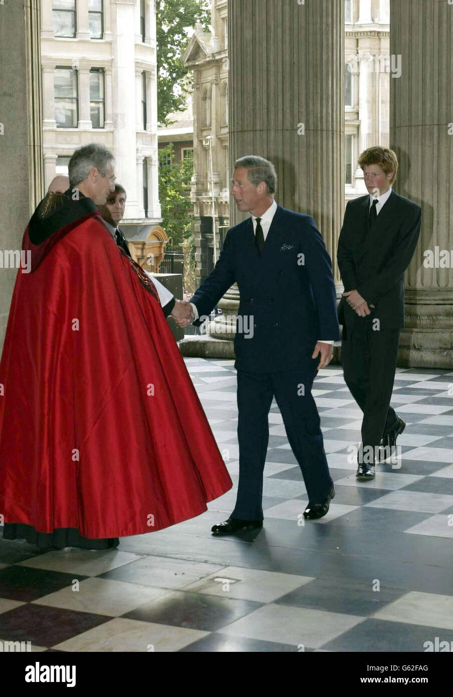 The Prince of Wales and Prince Harry arrive at the September 11th service at St Paul's Cathedral in London. * where they will attend the service of Remembrance and Commemoration for those who died a year ago in terrorist attacks on New York, Washington and Pennsylvania. During the service, 3,000 white rose petals representing those who died that day are being released from the cathedral's Whispering Gallery. Afterwards, the Prince Charles and Prince Harry are to meet relatives of the 67 British victims. Stock Photo