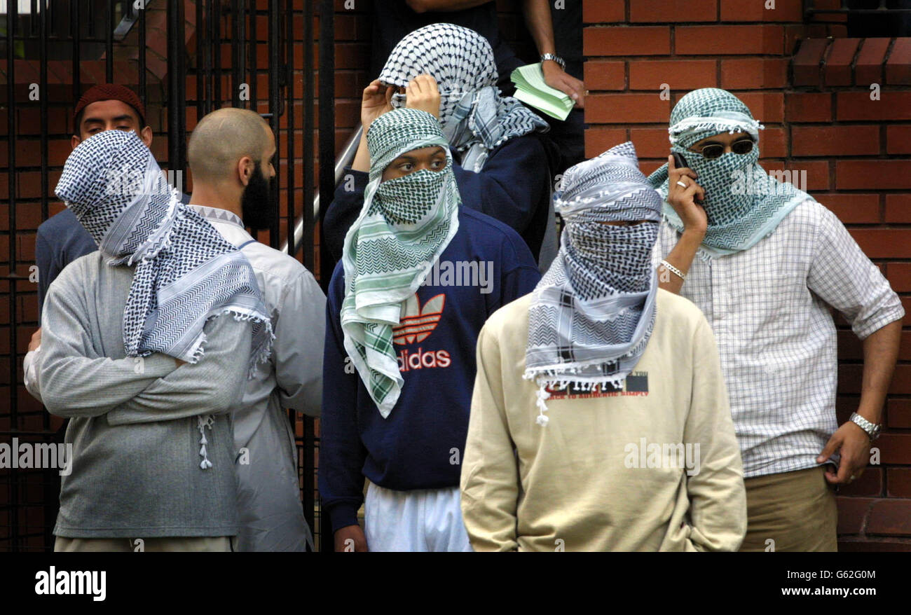 Muslims gathering at the Finsbury park Mosque, where a controversial conference on the September 11 terror attacks was at the centre of a tense standoff. * The Islamic conference, entitled September 11 A Towering Day in History, is due to hear from some of the most radical Muslim clerics in Britain, at the mosque in Finsbury Park, North London. It is being organised by al-Muhajiroun, who want to make Britain a Muslim state. See PA Story WAR Muslims. PA Photo Mark Lees Stock Photo