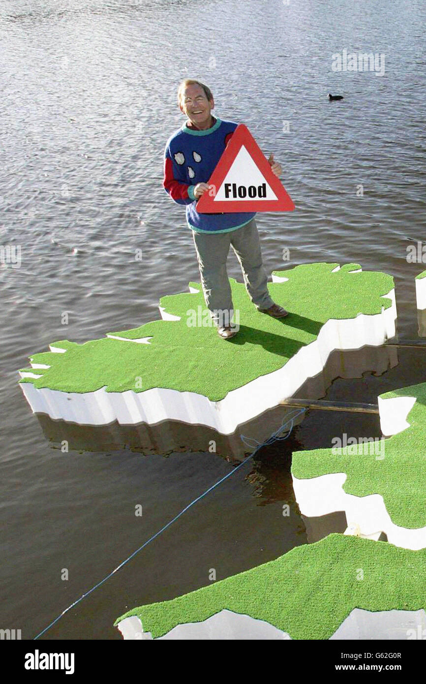 Weather presenter Fred Talbot lends his support to the Energy Saving Trust's Energy Efficiency Week 2004, by raising awareness about climate change on a floating weathermap of the British Isles at the Serpentine in London's Hyde Park Stock Photo