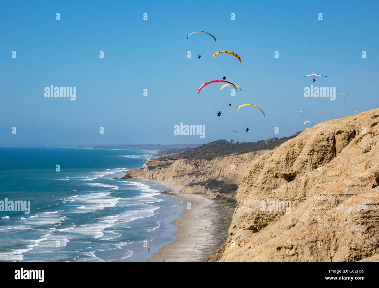 Paragliding along cliffs at Torrey Pines International Glider Port, San