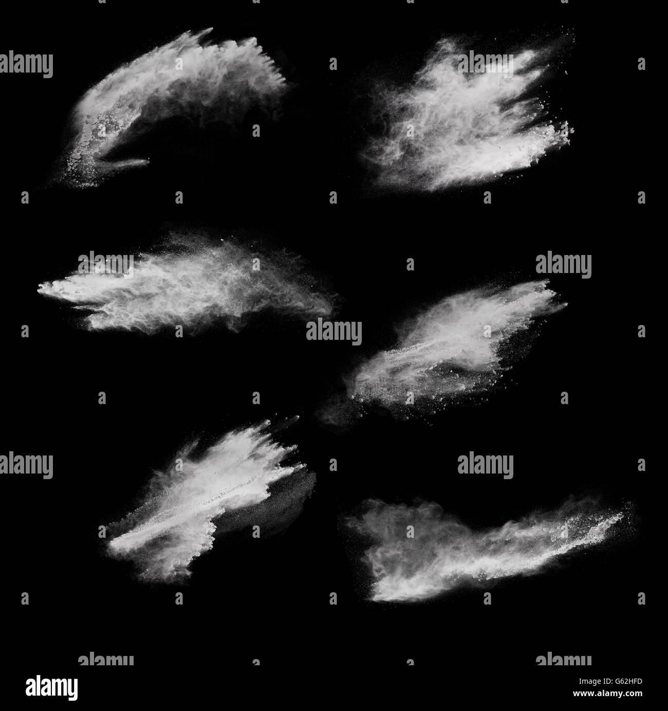 White powder explosion isolated on black background Stock Photo - Alamy