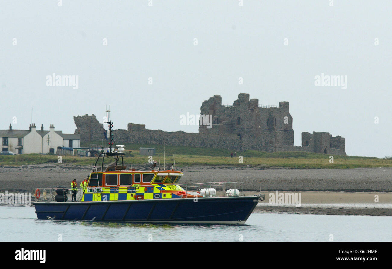 A police launch patrols the Walney Channel near Piel Castle near Barrow-in-Furness, Cumbria, ahead of tomorrow's arrival of two ships carrying radioactive material for the Sellafield nuclear re-processing plant. * A fleet of up to 20 protesting boats, led by Greenpeace's Rainbow Warrior, were in the south of the Irish Sea to highlight what they describe as the dangers of nuclear material. Stock Photo