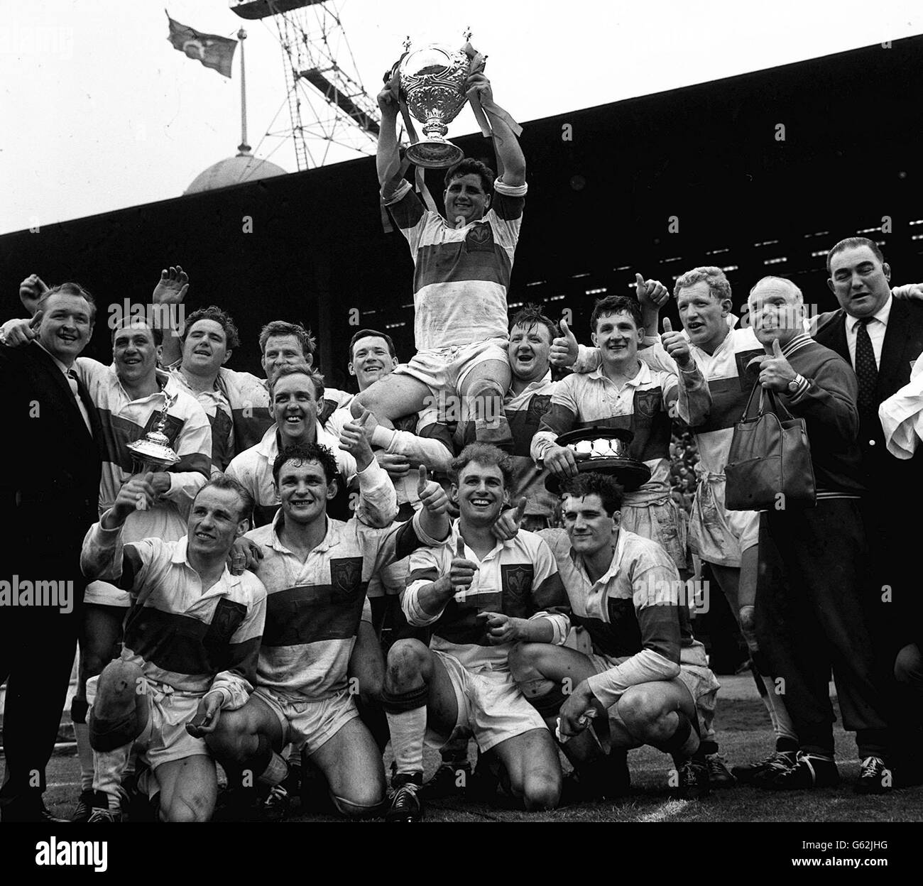 Members of the victorious wakefield trinity team surround their captain