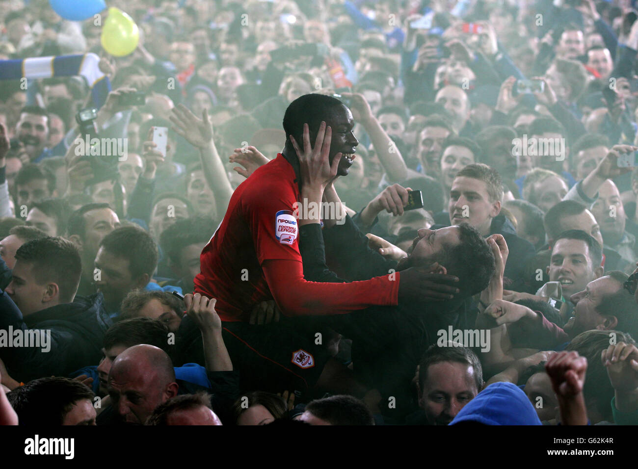 Cardiff City's Leon Barnett celebrates gaining promotion to Premier League after the npower Football League Championship match at the Cardiff City Stadium, Cardiff. Stock Photo