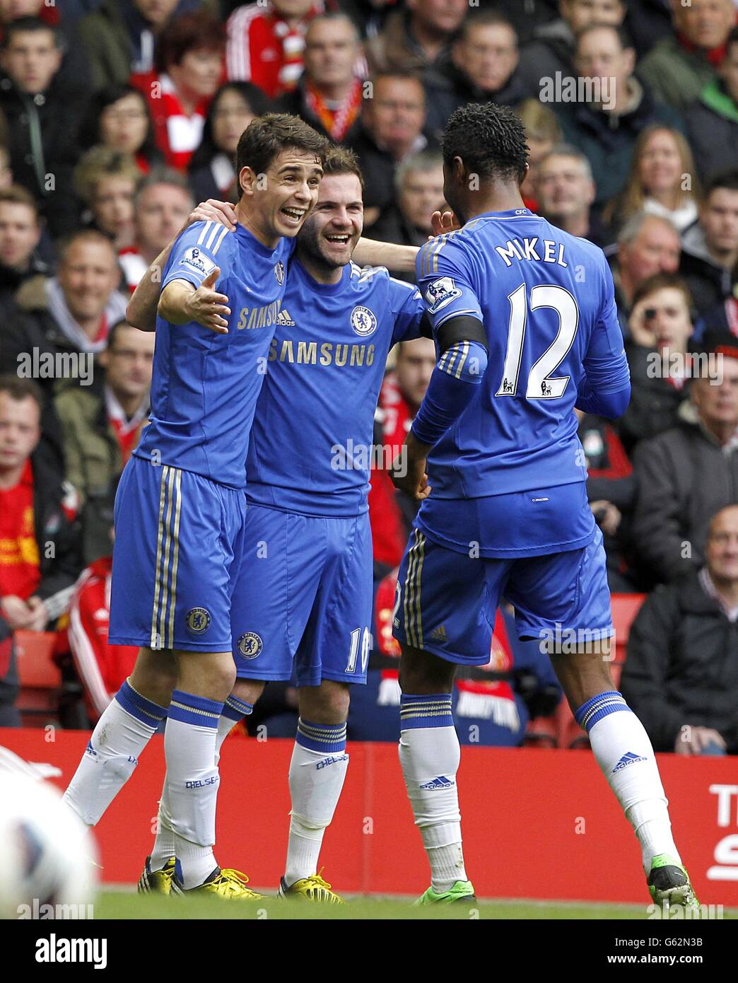 Chelsea's Oscar (left) celebrates scoring his teams first goal of the game with teammates Juan Mata (centre) and Mikel (right) Stock Photo