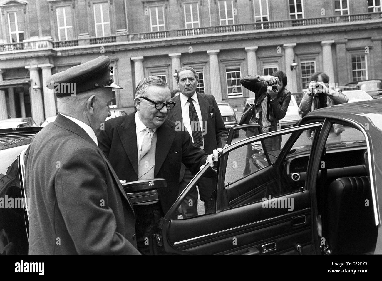 Sir Maurice Oldfield, former head of MI6, leaving Buckingham Palace after being Knighted. The former head of British counter-intelligence, whose last job was as security policy co-ordinator for Northern Ireland. Stock Photo