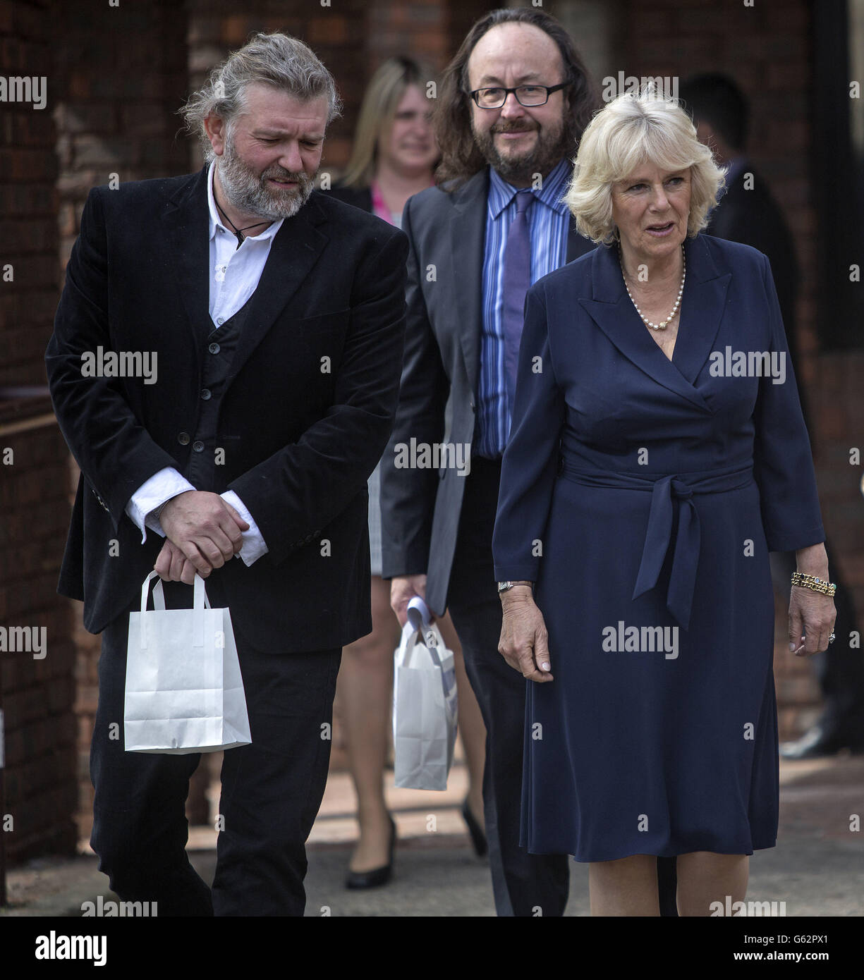 Duchess of Cornwall walks with celebrity chefs known as the Hairy