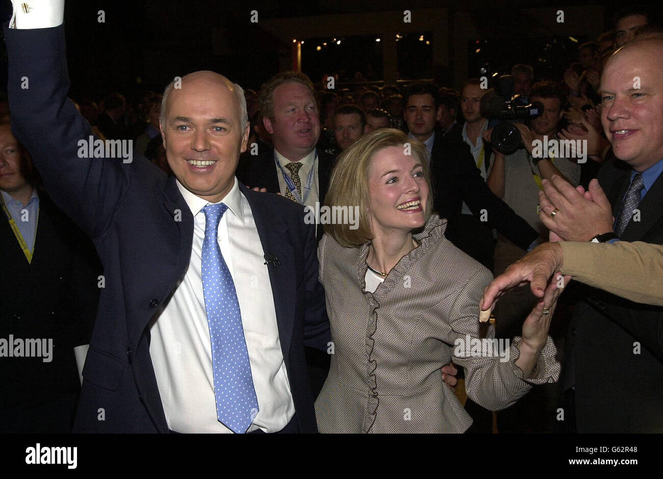 Conservative Party leader Iain Duncan Smith with his wife Betsy wave to the crowds after his address to the Conservative Party Conference in Bounemouth. Stock Photo
