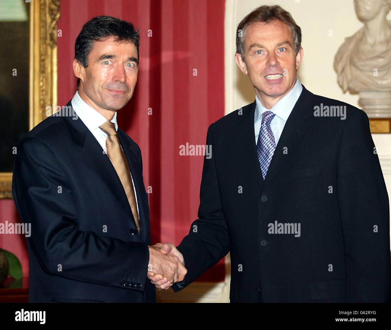 Danish Prime Minister Anders Fogh Rasmussen greeted by British Prime Minister Tony Blair on his arrival by British Prime Minister Tony Blair at No.10 Downing Street, London, for a press conference on Europe and the terrorist attack in Bali. Stock Photo