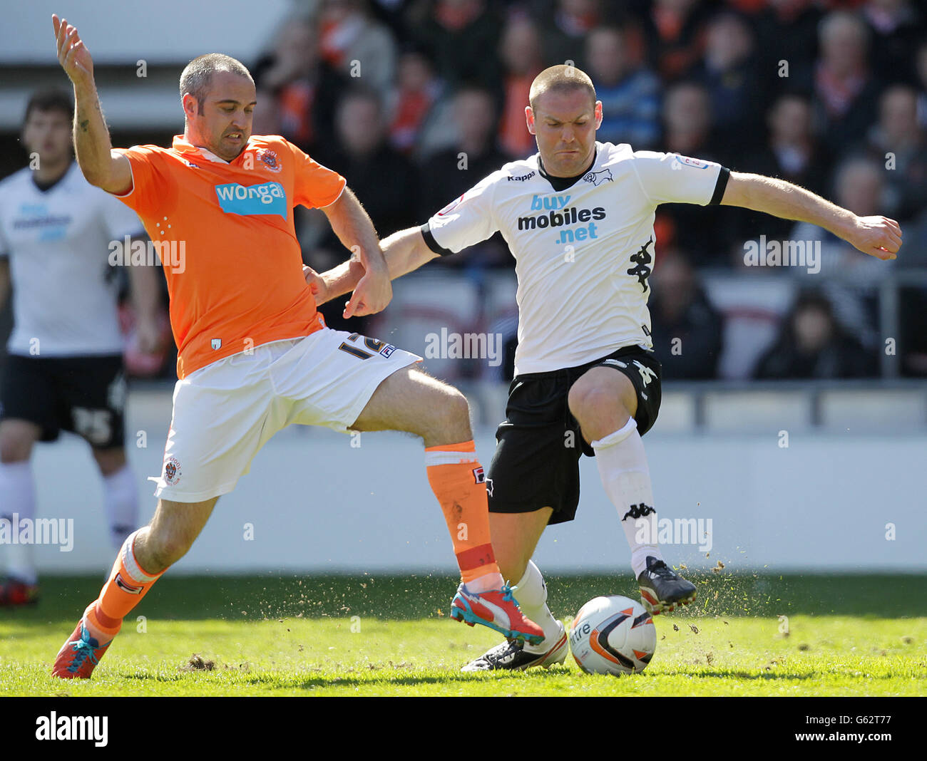 Soccer - npower Football League Championship - Blackpool v Derby County - Bloomfield Road. Blackpool's Gary Taylor-Fletcher (left) and Derby 's Jake Buxton (right) in action Stock Photo