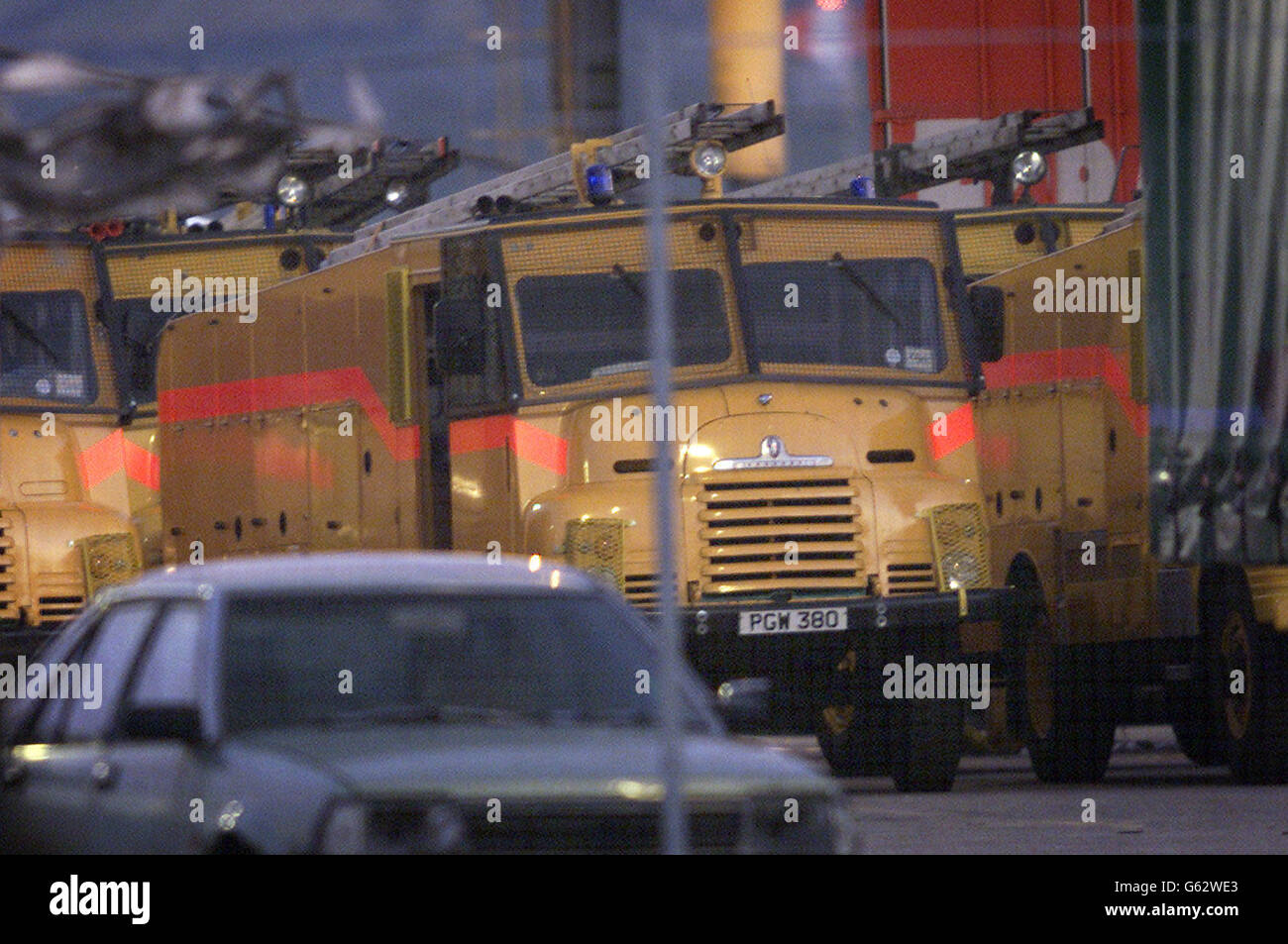 A convoy of British Army fire appliances (known as Green Goddess) arriving at Belfast dock- one of which fell victim to mechanical breakdown - for security reasons the fire appliances have been painted yellow, *...to distinguish them as a fire rescue appliance rather than a army vechicle, incase of a terrorist attack, the army fire appliances will replace the regular fire service vehicles, if a an expected nationwide strike takes place in two weeks. Stock Photo