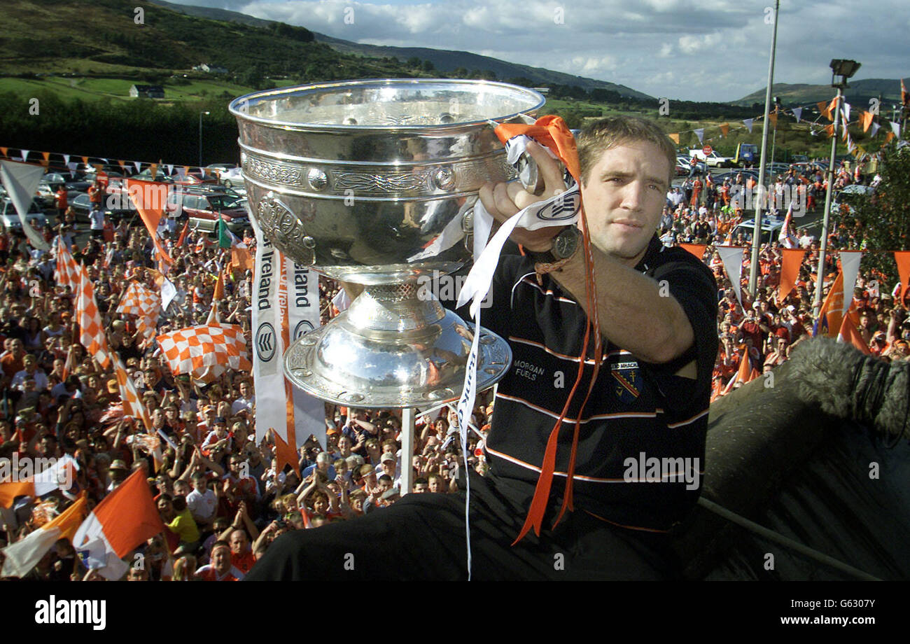 Armagh captain kieran mcgeeney holds aloft the sam maguire cup hi-res ...